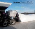 Большая бочка с консервантом на мельнице Murska W-Max 20 CВ с упаковщиком 